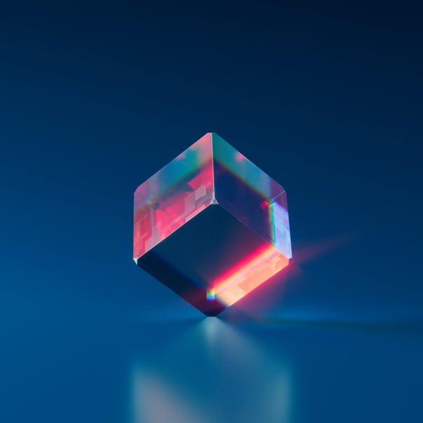 A glass cube in a blue background.